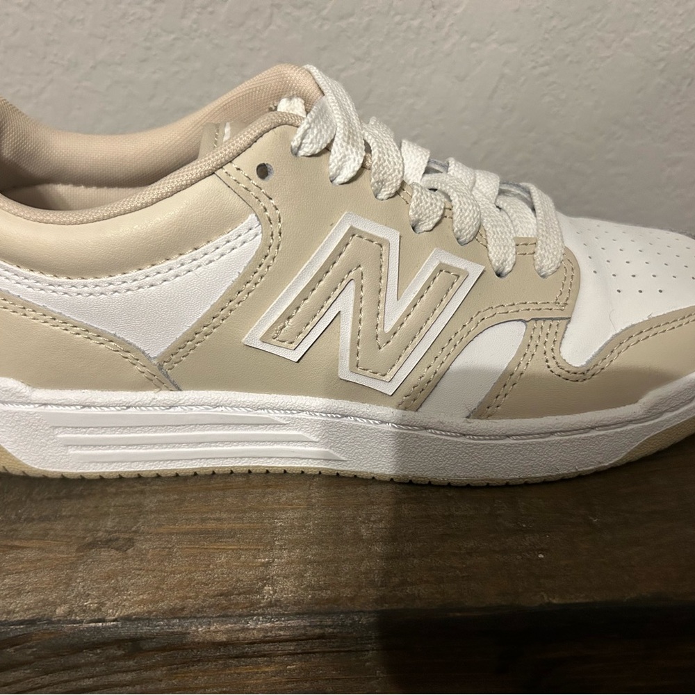 Like new, wore once in the house. New Balance 480 Size 5 Cream and White Shoes.